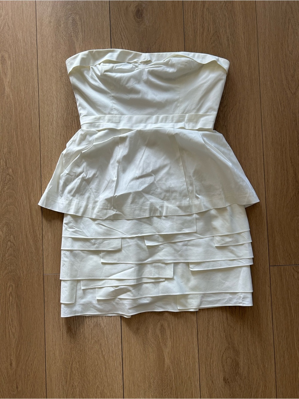 BCBGMaxAzria Strapless White Peplum Tiered Mini Dress